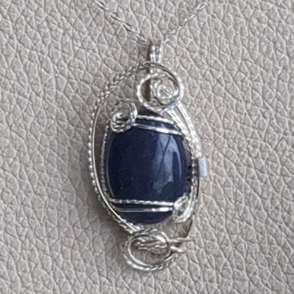 Blue Goldstone in Sterling silver wire wrapped pendant 