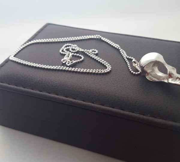 Sterling Silver Swallow Skull Pendant