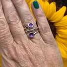Sterling silver with purple enamel adjustable ring .