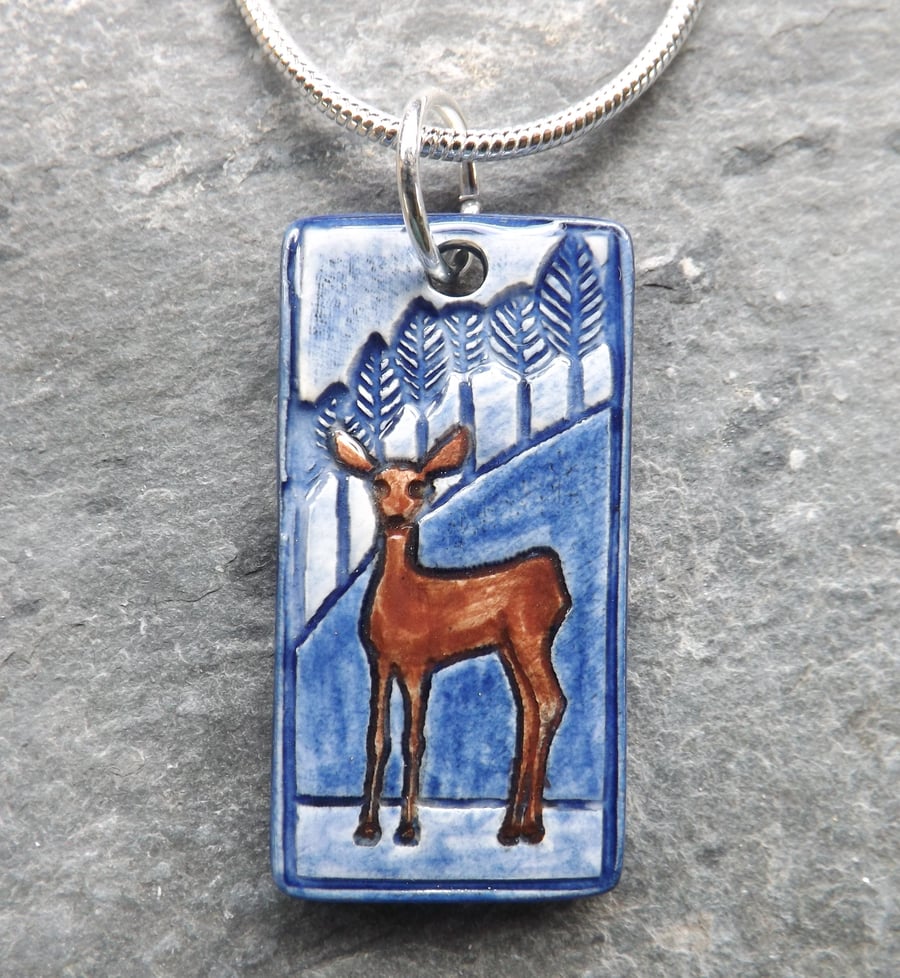 Handmade Ceramic Deer Pendant in blue