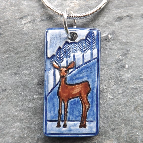 Handmade Ceramic Deer Pendant in blue