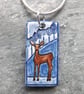 Handmade Ceramic Deer Pendant in blue - Image 1