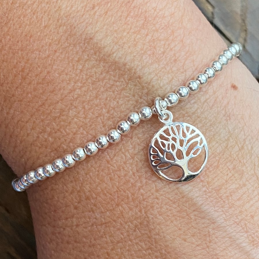 Sterling silver bead bracelet with tree of life charm. Stretch bracelet. 