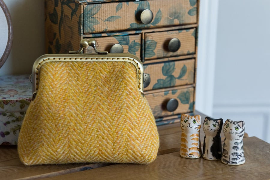 Frame purse made with buttery yellow Harris Tweed and Liberty lawn lining