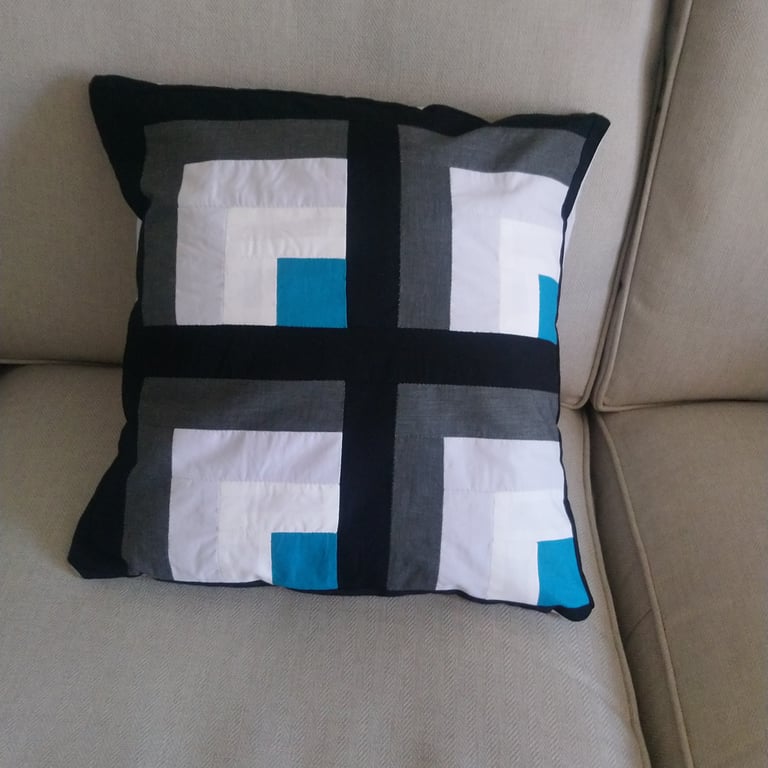 Patchwork cushion cover with a 3D effect. Black and grey cushion