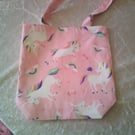 Unicorns and Rainbows on a Pink background Shoulder Bag