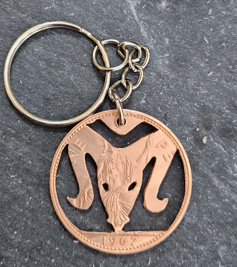 Aries ram symbol cut from penny coin as keyring or bag charm