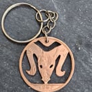 Aries ram symbol cut from penny coin as keyring or bag charm