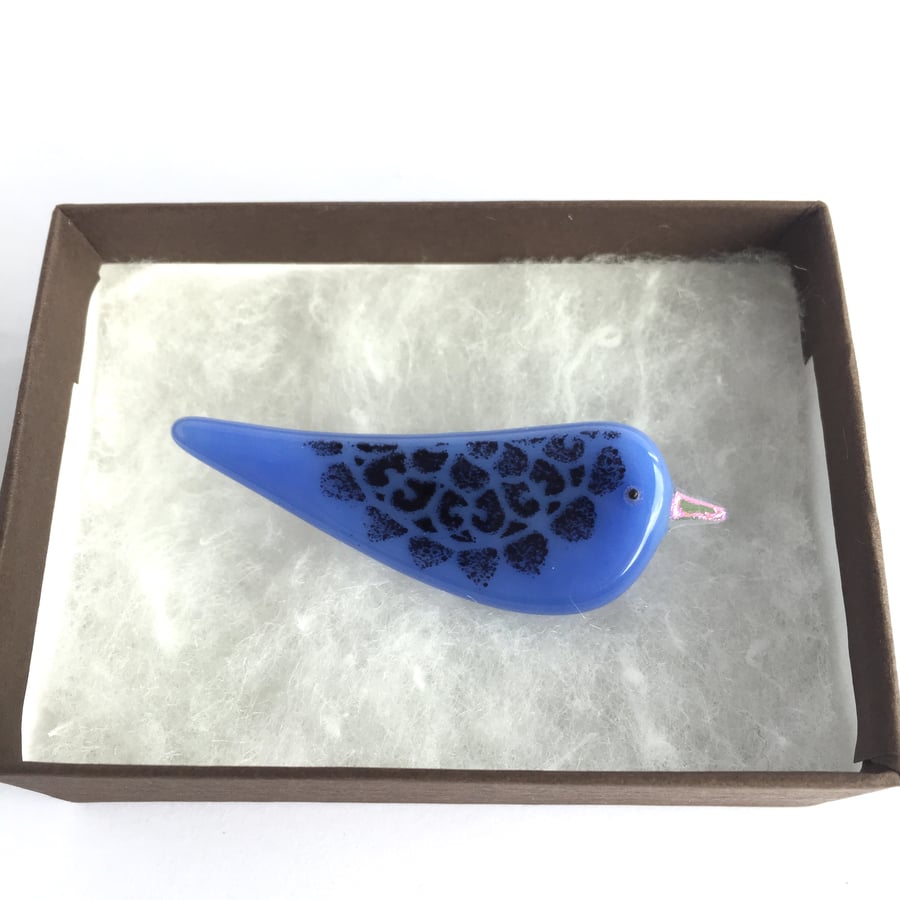 Violet or periwinkle-blue bird brooch with pink beak