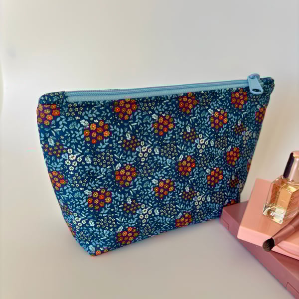 Make up bag, small toiletry bag, water resistant lining, in blue floral design