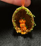 Little pumpkin stack in a walnut shell