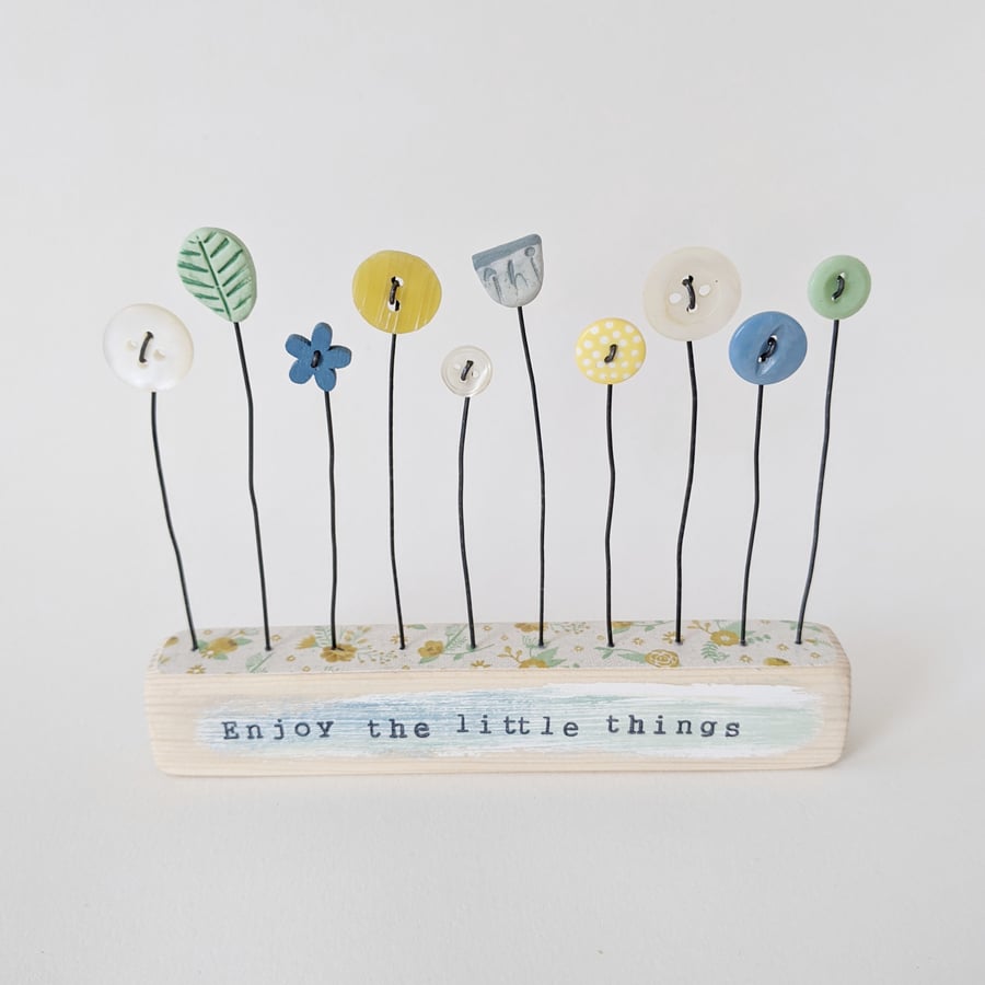 Button and Clay Flower Garden in a Floral Block 'Enjoy the little things'