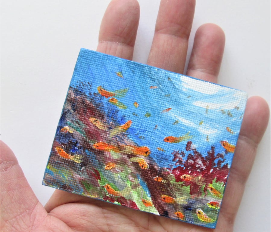 Fishes. In the Sea Magnet. Painting