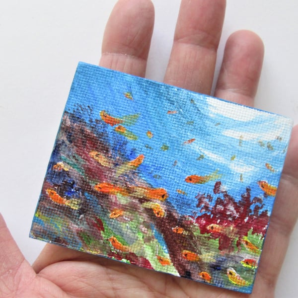 Fishes. In the Sea Magnet. Painting
