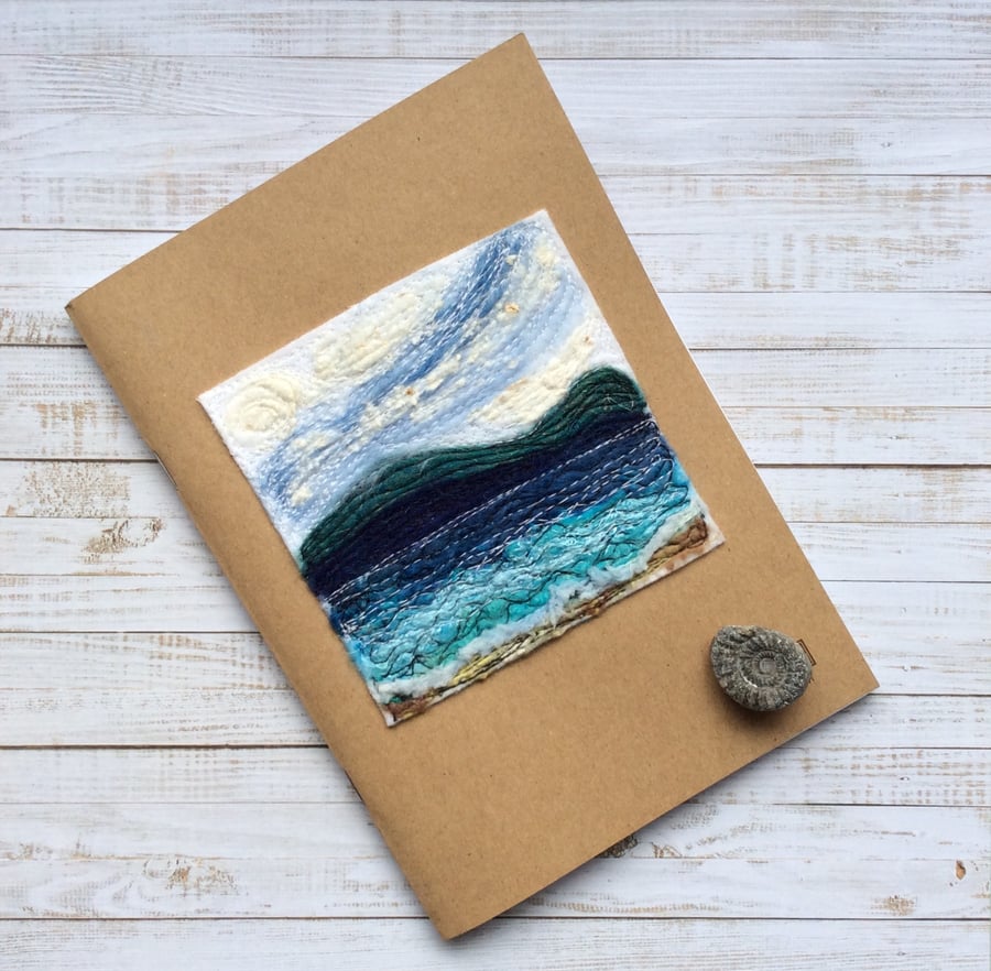 Embroidered seascape sketchbook, journal or scrapbook.