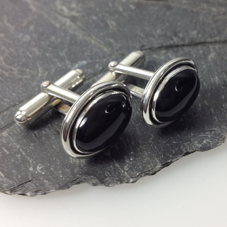 Oval sterling silver and black onyx cufflinks