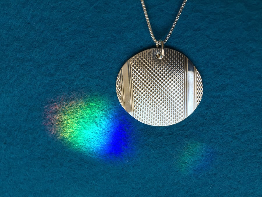 Oval necklace made from a 1938 Birmingham silver cigarette case
