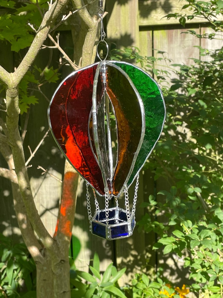 Multicoloured stained glass hot air balloon garden spinner.