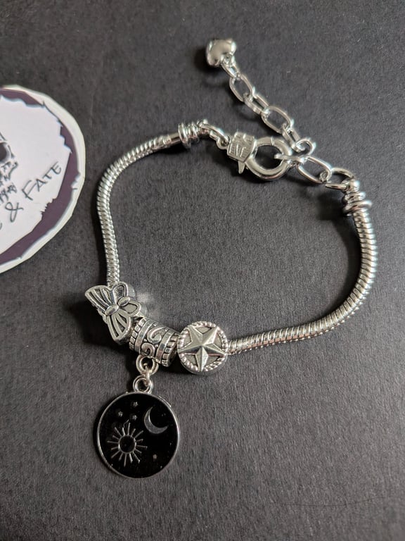 Charm bracelet with sun and moon