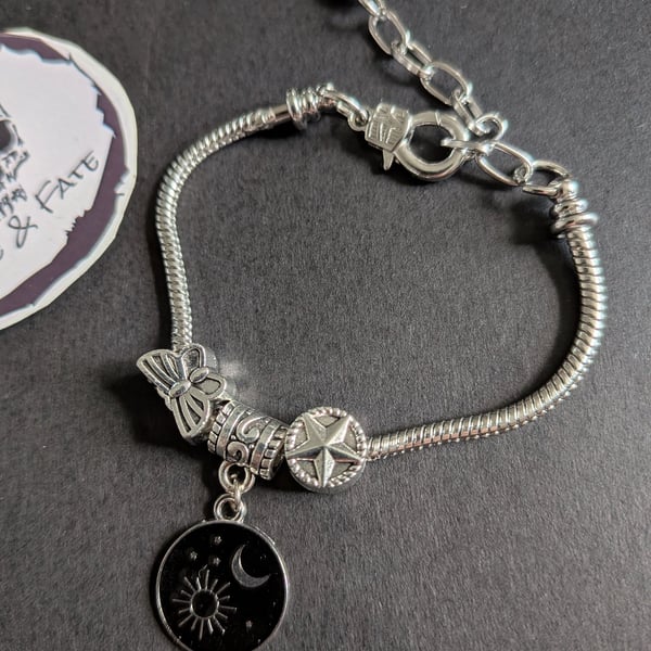 Charm bracelet with sun and moon