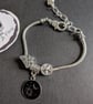 Charm bracelet with sun and moon - Image 1