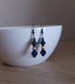 AB FACETED CRYSTAL AND ANTIQUE BRONZE EARRINGS. - Image 4