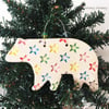 Ceramic Polar Bear with bright star design. Pottery Christmas decoration bear