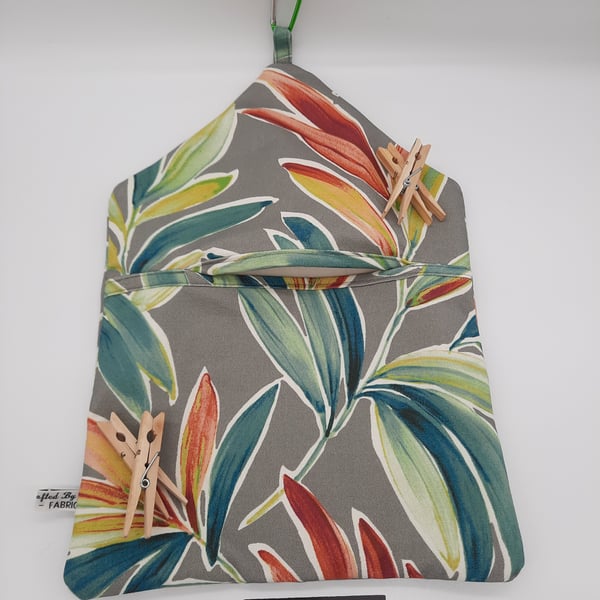 Clip on peg bag in grey and colourful plant print.  Free uk delivery 