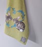 Rabbits in forget-me-not heart tea towel design, organic cotton, hanging loop - Image 4