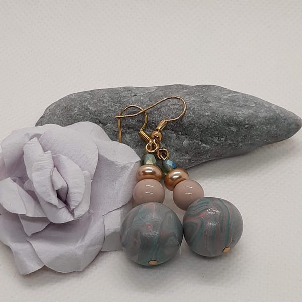 Peach and sage green dangly earrings 