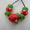 handmade strawberry lampwork beads
