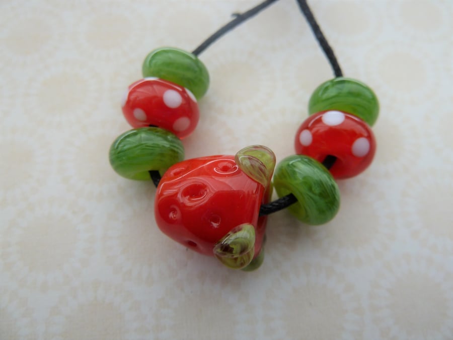 handmade strawberry lampwork beads