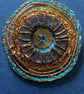 Pavement finds brooch