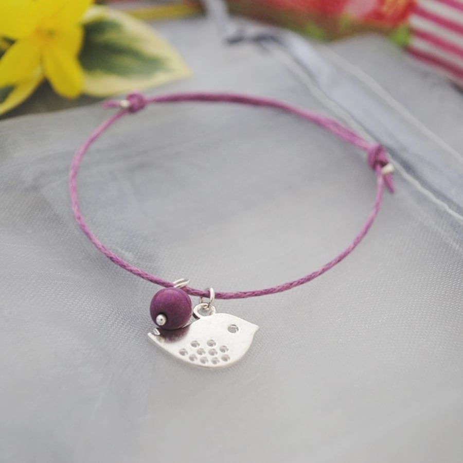 Friendship Bracelet-Violet cord with silver bird 