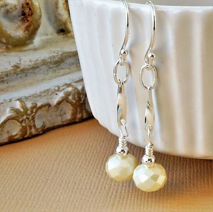 Pearly cream faceted glass and silver earrings