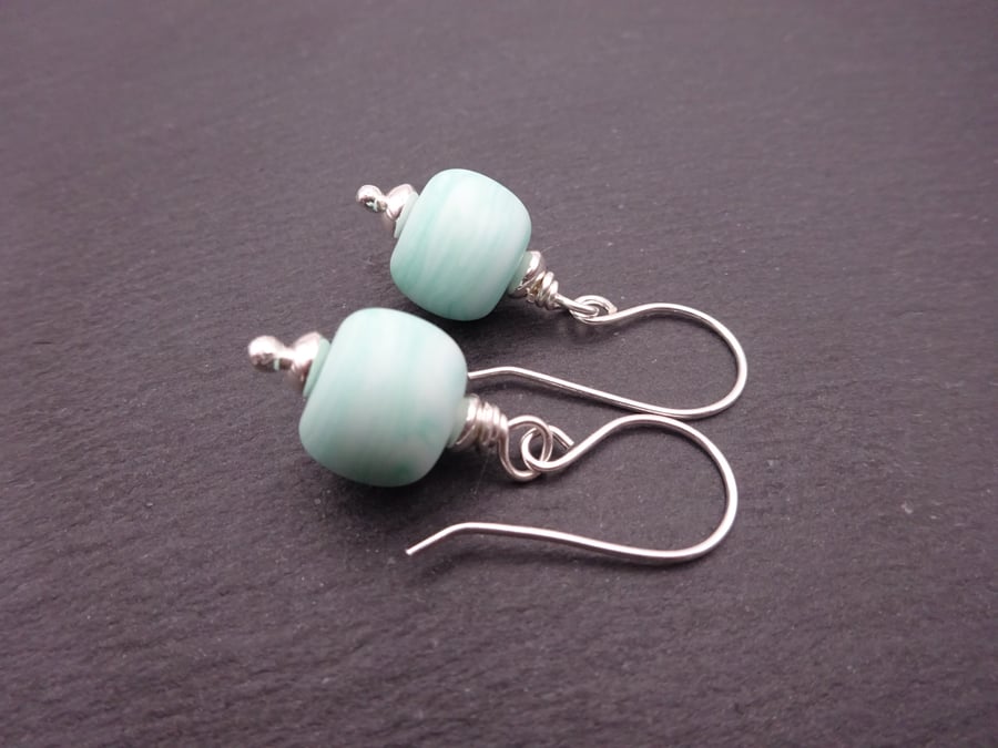 pastel green lampwork glass earrings
