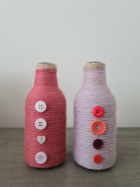 Set Of 2 Pink Yarn Wrapped Bottles With Contrasting Buttons