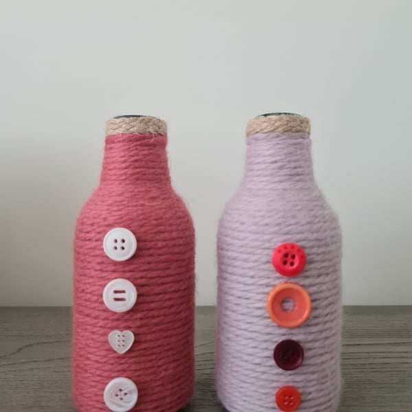 Set Of 2 Pink Yarn Wrapped Bottles With Contrasting Buttons