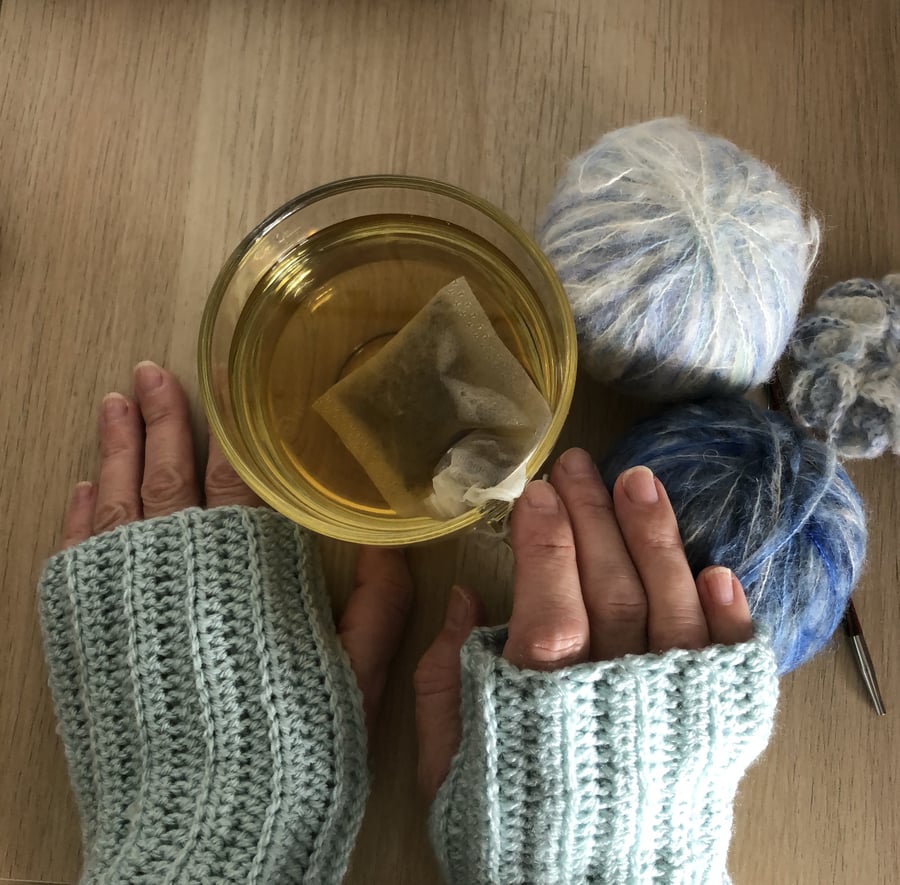 Fingerless gloves, ice blue wristwarmers, crocheted
