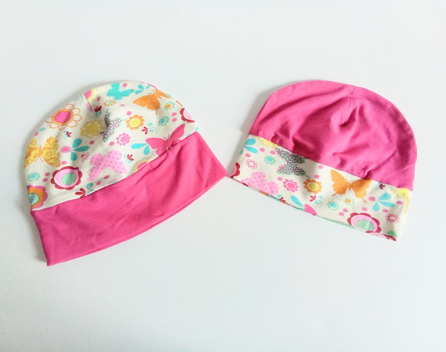 Baby hats, 6-12 months,  pack of two, pink and butterflies, jersey knit hats