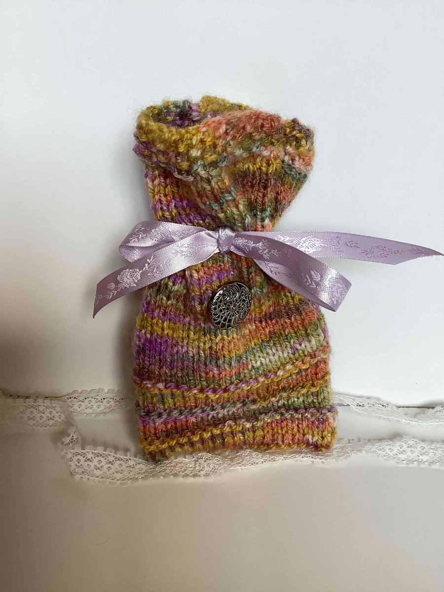 Unique knitted gift bag with silver button