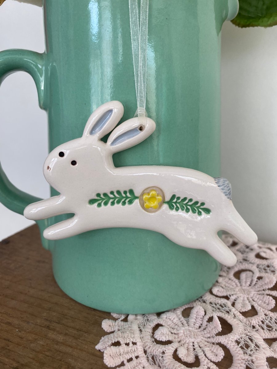 Ceramic Leaping Bunny decoration yellow flower