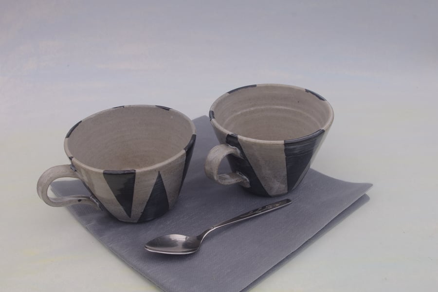 Pair of cups with slip decoration