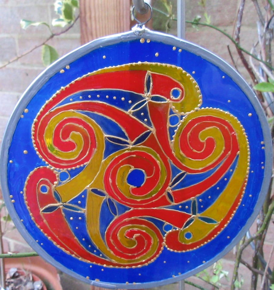 Suncatcher - Celtic Spirals in fire colours on azure background - large