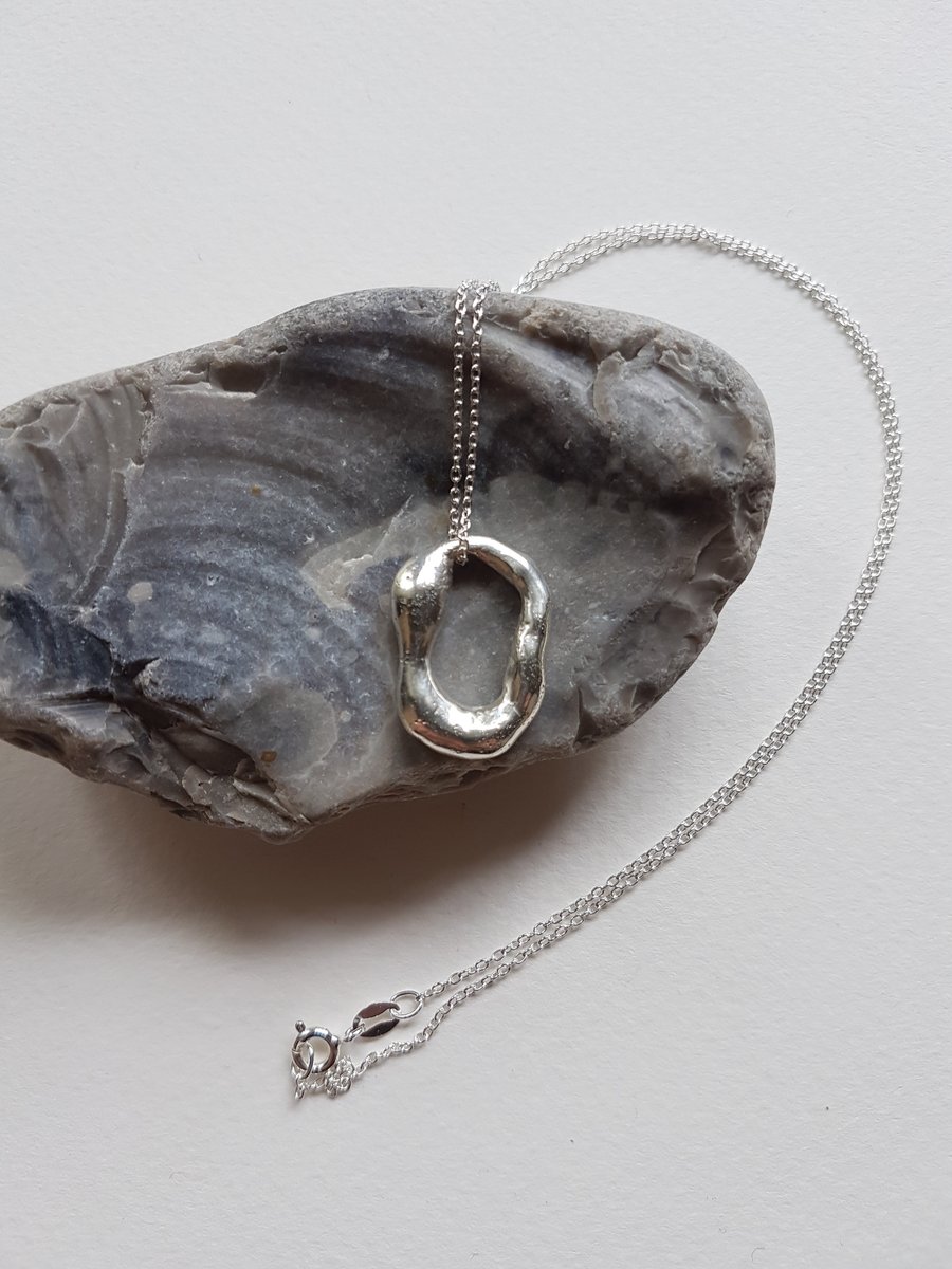 Molten sterling silver organic shaped pendant