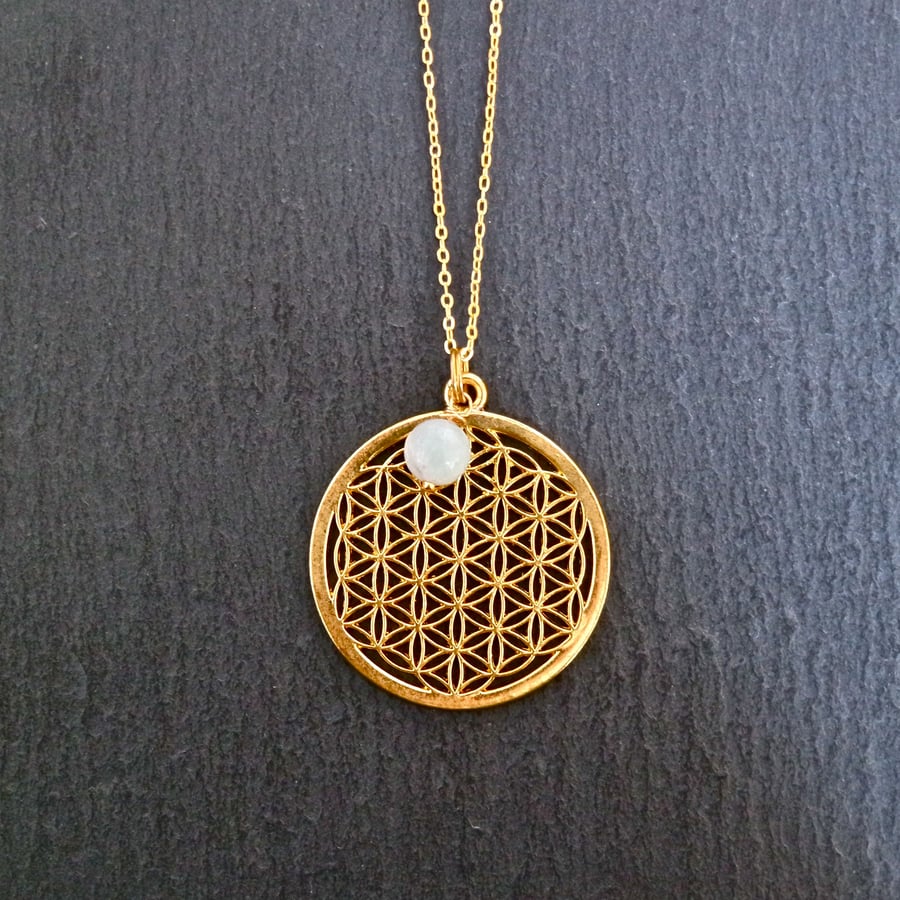 Necklace - flower of life with a blue amazonite bead