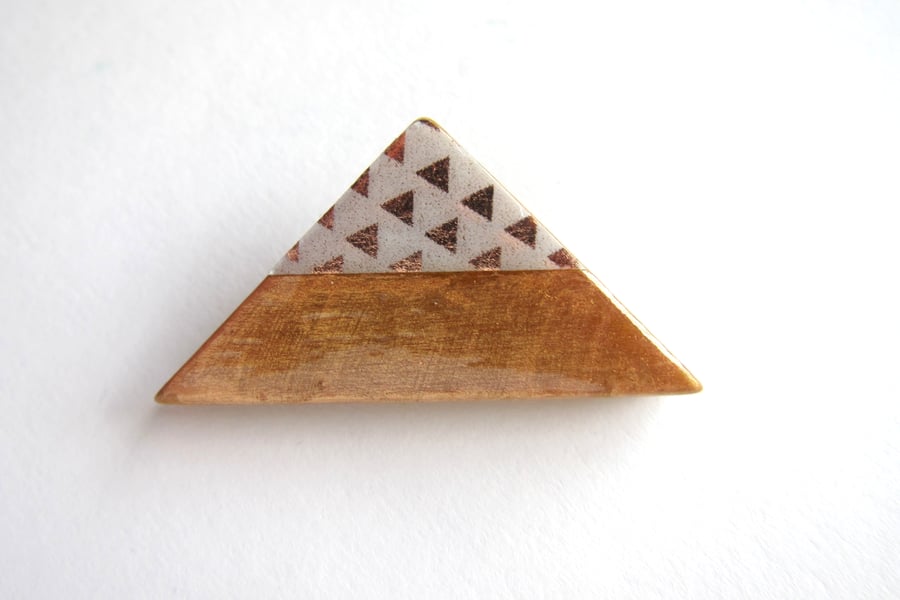 Triangle brooch in copper wood