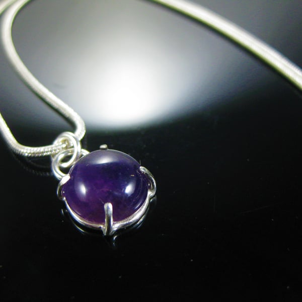 Purple amethyst and silver pendant
