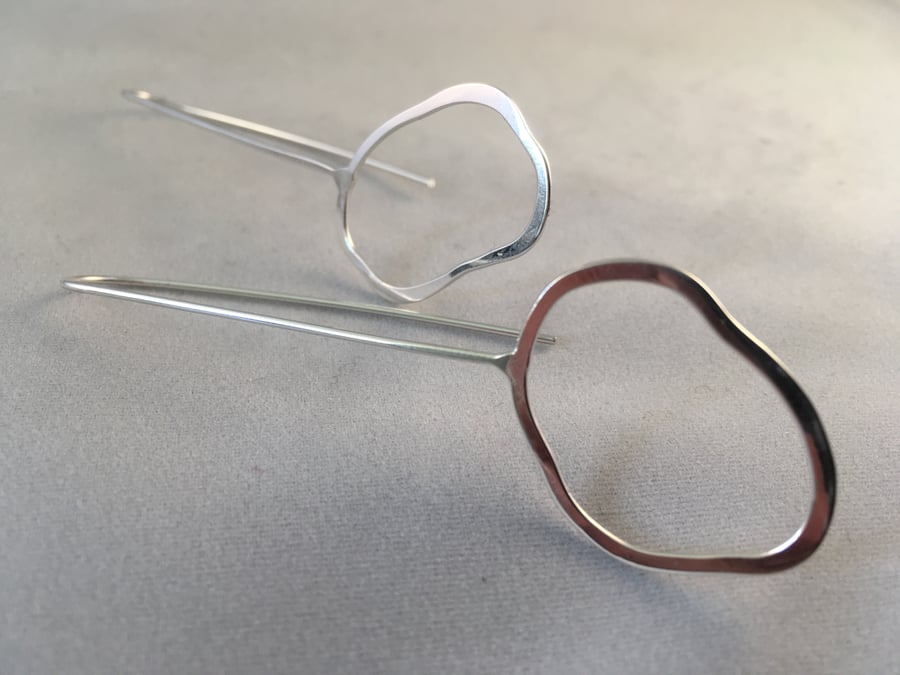 Long silver dangle oval earrings