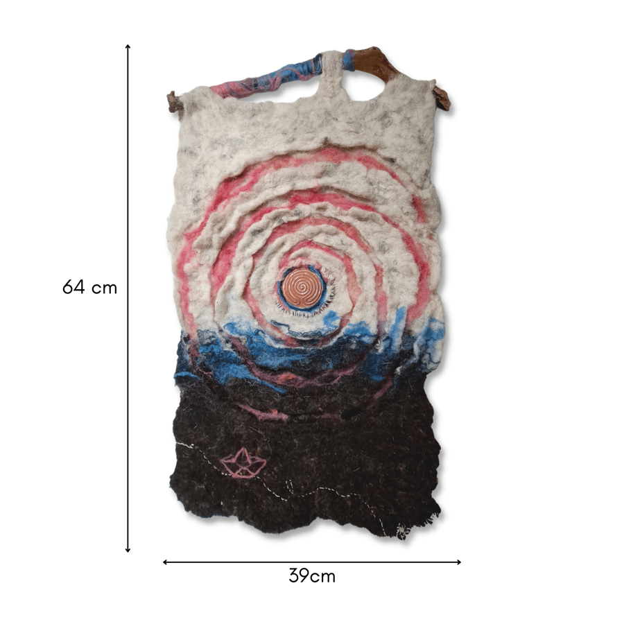Felted and hand stitched wall hanging featuring a terracotta labyrinth